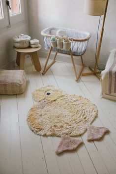 a bathroom with a rug on the floor