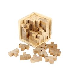 a wooden block set with pieces cut out to make it look like they are in the shape of a cube