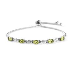 PRICES MAY VARY. OLIVE GREEN PERIDOT BRACELET - Elevate your style with the undeniable beauty of our 5-stone peridot bracelet for women, meticulously crafted to adorn your wrist with unparalleled elegance. The peridot charm bracelet features five sparkling peridot gemstones, each radiating a mesmerizing hue of vibrant olive green. STAINLESS STEEL - The peridot stainless steel bracelets for women are made of stainless steel known for their natural elegance and strength. This stainless steel brace Adjustable Green Jewelry For Wedding, Green Gemstone Bracelet For Weddings, Lime Green Gemstone Jewelry For Wedding, Elegant Lime Green Jewelry For May Birthstone, Lime Green Gemstone Wedding Jewelry, Green Adjustable Chain Jewelry For Anniversary, Green Bracelet Jewelry For Wedding, Green Jewelry With Adjustable Chain For Anniversary, Green Bracelet With Adjustable Chain