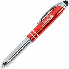 a red and silver pen with the word coca cola on it