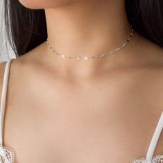 "A simple, dainty, silver chain with a sparkly, reflective finish. This necklace is made of sterling silver. Lengths 13 inches and under will come with an additional 2 inch extension so that you can adjust it to fit perfectly and comfortably. --------------------♥ PROMOS ♥-------------------- Want 10% off? Join the mailing list by visiting http://bit.ly/vedern . Your discount code will work on Vedern at Etsy. --------------------♥ BUY WITH CONFIDENCE ♥-------------------- Don't love it? Message Sparkly Choker, Simple Choker, Choker Silver, Choker Chain, Heavy Chain, Dainty Chain, Silver Choker, Necklace Simple, Chain Choker