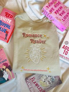 "This is the Crewneck version of the romance reader hoodie.  It is embroidered with \"romance reader\" and \"falling in love with fictional men\" on the bottom. These sweatshirts are unisex sizing and Gildan brand. They are 50/50 cotton and polyester.  For an oversized fit, I recommend going a size up Please be mindful of the processing times on my shop before ordering." Book Lovers Sweatshirt, Booktok Sweatshirts, In Love With Fictional Men, Book Sweatshirts, Bookish Clothing, Booktok Merch, Book Lover Gifts, Romance Reader, Book Merch