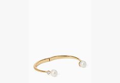 we say stack your bracelets to make a statement. this makes the first one in your pile. or the 100th. | Kate Spade Pearls Of Wisdom Open Hinged Bangle, Cream Multi Gold Pearl Bangle Bracelet Fine Jewelry, Kate Spade Bangle Bracelet For Weddings, Kate Spade Formal Bangle Bracelet, Chic Kate Spade Bangle Bracelet, Kate Spade Elegant Bangle Jewelry, Bracelets To Make, Pearls Of Wisdom, Kate Spade Outlet, Pearl Bangle