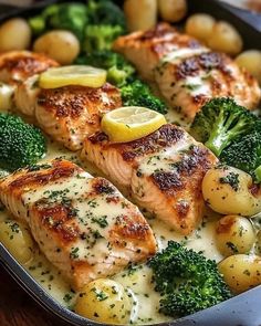 broccoli and potatoes in a pan with salmon