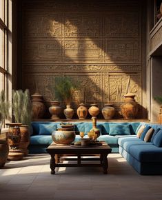 a living room filled with blue couches and vases