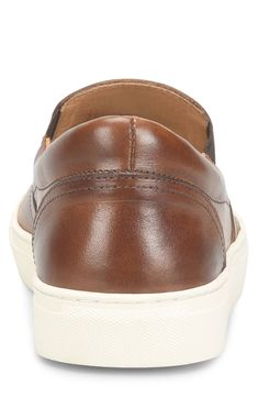 Classic and comfortable, this sneaker topped with softly polished leather features a simple, streamlined upper and a cupsole made of grippy rubber. Removable insole Leather upper and lining/rubber sole Imported Brown Leather Slip-on Sneakers With Textured Sole, Sporty Brown Slip-ons With Rubber Sole, Brown Cushioned Slip-on Sneakers, Classic Slip-on Sneakers With Contrast Sole, Brown Low-top Slip-ons With Contrast Sole, Sporty Brown Slip-ons With Round Toe, Comfortable Leather Sole Slip-on Sneakers, Casual Leather Slip-ons With Contrast Sole, Brown Synthetic Sneakers With Leather Sole