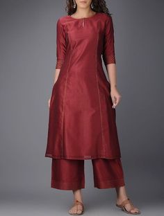 Maroon A-line Kurta With Palazzo FABRIC DETAILS: TOP COLOR - MAROON, TOP FABRIC - CHANDERI BOTTOM COLOR- MAROON, BOTTOM FABRIC- CHANDERI Silk Kurti, Simple Kurta Designs, Designer Kurti Patterns, Simple Kurti Designs, Salwar Designs, Long Kurti Designs, Long Kurti, Salwar Kamiz