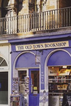 the old town bookshop is purple and white