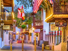 an image of a street that is decorated with american flags