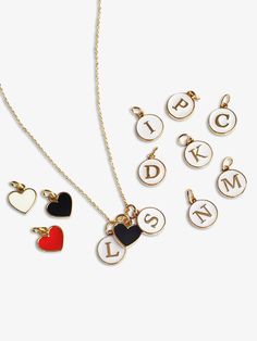 Welcome to Mojo! Make your jewelry even more meaningful be adding personalized letters and hearts to your Mojo necklaces or bracelets. Combine a heart charm with the initials of your kids, siblings, or besties. Make this piece your own or give a thoughtful gift! Note, this listing is only for the letters and/or heart charms - chains are not included. If you need a necklace, check out the links below! ★PRODUCT DETAILS★ Quantity: 1 letter or heart charm - you choose! Material: letters are enamel, Valentine's Day Initial Pendant Charms Jewelry, Black Personalized Initial Pendant Jewelry, Heart Shaped Letter Beads Jewelry For Friendship, Personalized Black Initial Pendant Jewelry, White Heart Charm Jewelry For Everyday, Customizable White Heart Pendant Jewelry, Customizable White Meaningful Jewelry, Customizable Meaningful White Jewelry, Meaningful Customizable White Jewelry