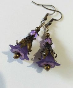 Purple Victorian bronze flower earrings lavender flower set necklace earrings Purple flower earrings Boho bronze earrings gift Gorgeous Victorian style jewelry set necklace and earrings . Bohemian necklace and earrings . Beautiful Set of bronze-tone Antique style lavender purple plastic flowers  and beautiful ornamented caps necklace and earrings. Bronze Victorian style necklace and earrings. Boho necklace. Bohemian necklace and earrings. Romantic necklace and earrings. Royal style jewelry set. Nickel-free Czech Glass Flower Jewelry, Purple Metal Drop Earrings, Bronze Czech Glass Dangle Jewelry, Bohemian Brass Flower Earrings, Handmade Purple Metal Earrings, Bronze Czech Glass Drop Earrings, Bohemian Metal Jewelry With Flower Charm, Lavender Bohemian Dangle Jewelry, Adjustable Copper Flower Jewelry