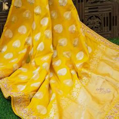 Sunflower Yellow Handwoven Banarasi Silk Mor Boota Embroidery Kadwa Saree - Khinkhwab Transitional Pre-draped Saree With Cutdana For Traditional Ceremonies, Festive Paithani Silk Pre-draped Saree With Resham Embroidery, Embroidered Silk Pre-draped Saree For Puja, Semi-stitched Paithani Silk Blouse Piece With Traditional Patterns, Bollywood Style Semi-stitched Embroidered Fabric With Zari Weaving, Traditional Pre-draped Saree With Zari Work For Transitional Season, Traditional Banarasi Silk Pre-draped Saree For Diwali, Paithani Silk Pre-draped Saree For Traditional Ceremonies, Banarasi Silk Unstitched Suit With Resham Embroidery