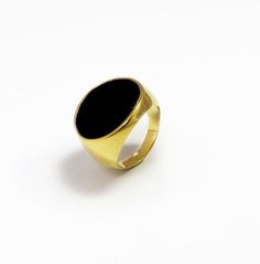 Dramatic gold plated signet ring with hand painted black enamel, its a modern and urban piece that is wearable by any woman or man. The ring is made of high quality nickel-free thick layer 24K gold plating over a brass base, it has a dazzling high polish finish with clean lines by the highest standard and materials. show off your exceptional style when you wear this large enamel ring, this showy piece is certainly a grand fashion statement.Customization:• You can order this ring in different sha Modern Enamel Rings For Formal Occasions, Modern Yellow Gold Enamel Ring, Gold Enamel Rings In Modern Style, Modern Gold Rings With Enamel, Modern Black Enamel Ring Jewelry, Modern Black Enamel Ring, Minimalist Black Engraved Promise Ring, Modern Black Enamel Signet Ring, Modern Black Enamel Rings For Formal Occasions