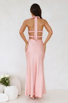 Length from bust to hem of size S: 128cm. Chest 36cm, Waist 32cm, across front only of size S. Maxi dress. Semi-lined. Model is a standard XS and is wearing XS. True to size. Slight-stretch. Satin. Halter tie. Underwire. Elastic back. Flowy skirt. Zipper. Cold hand wash only. Polyester/Spandex. Bring style to the party with the Socialite Events Halter Satin Maxi Dress. Featuring a silky satin silhouette, a halter tie and an elastic back design. Style with heels and curls to impress. Halter Party Dress, Dress Peach, Skirt Zipper, Bridal Shower Dress, Shower Dresses, Jumpsuits And Romper, Maxi Dress Wedding, Satin Maxi, Dress Satin