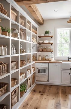 Transforming your kitchen pantry into a farmhouse-style haven isn't just about utility but creating a space that exudes charm and warmth. Imagine the elegance #pantry #storage Open Pantry Shelves Kitchen, Rack With Baskets, Butlers Pantry Styling, Open Pantry In Kitchen, Pantry Built In Shelves, Simple Butlers Pantry, Butlers Pantry Organization, Beadboard Pantry, Prep Kitchen Pantry