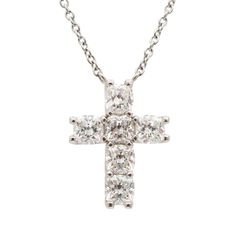 Gender: Ladies    Metal Type: 950 platinum    Length: 16.00 inches    Cross pendant measurements: 18.15mm x 14.15mm    Weight: 6.22 grams    Lady's custom made polished 950 platinum, diamond necklace. Engraved with "PT950".    Pre-owned in excellent condition.. Might show minor signs of wear.    Shared-Prong Set in 950 Platinum with:    Six (6) cushion brilliant cut natural diamonds:    Measurements: 4.45mm x 4.10mm x 2.80mm in depth.  Weight Range: 0.403 ct. - 0.438 ct.  Estimated Total Weight: 2.520 ct.  Color: G - H  Clarity: VS1 - VS2  Polish: Very Good  Symmetry: Very Good    TOTAL WEIGHTS:    Total weight of diamond(s): ~2.52 ctw.  Please reference the dimensions noted in the description above for the most accurate measuremens. Metal Pendant Necklace, Cushion Diamond, Diamond Cross Pendants, Diamond Cross, Modern Necklaces, Gemstone Necklace Pendant, Cross Jewelry, Cross Pendant Necklace, Accessories Jewelry Necklace