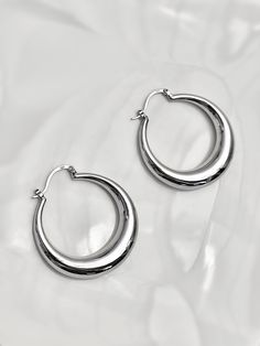 These gorgeous half moon earrings are made for the brightest and boldest. They are perfect for everyday wear or will complete your look for the holidays. They are able to make any style more lively and visible. These earrings are plated in solide 925 sterling silver✨ Size: Diameter is 40 mm / 1,57 in Weight: 10g (the weight of an earring is 5g) 💌DELIVERY * Orders are processed and delivered to the post office within a maximum of 48 hours after payment has been validated by the ETSY platform (ex Semi-circle Metal Hoop Earrings, Trendy Crescent Earrings For Pierced Ears, Trendy White Gold Hoop Earrings, Trendy Round Earrings With Polished Finish, Trendy Small Hoop Earrings In White Gold, Tarnish Resistant Crescent Hoop Earrings, Modern Silver Crescent Earrings, Modern Silver Semi-circle Jewelry, Minimalist Crescent Hoop Earrings