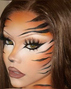 https://www.instagram.com/p/C_Je_sMyQSy/?igsh=MzRlODBiNWFlZA== Cute Tiger Costume, Tiger Outfit Halloween, Big Cat Halloween Costume, Animal Print Halloween Makeup, Women Tiger Costume, Tiger Stripe Makeup, Lepord Makeup Women, Animal Make Up Ideas, Halloween Costume Animals