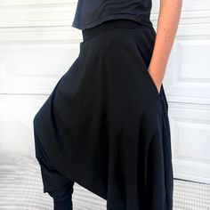 "Black Samurai Style Ninja Pants for Women and Men. This Stretch Cotton Harem Pants Fit Plus Size. -Unisex -Stretch -Flowing relaxed fit -Inner drawstring to secure the waist -2 side pockets Great for Yoga, Dance, Exercises, Meditations, Yoga Practice and beyond... Materials: black color cotton blend (90% cotton 10% lycra). Fabric for this pair were bought in Fashion District, LA and the pant was made in one of the studios in Los Angeles, CA. Measurements: Fits: S, M, M/L -Length: 41\" (~102 cm) Dance Exercises, Samurai Style, Ninja Pants, Black Samurai, White Yoga Pants, Yoga Pants Men, Samurai Pants, Cotton Harem Pants, Black Harem Pants