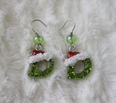 Christmas Letter Earrings The perfect give for this holidays! - Resin letter size approximately: 0.43 inch width x 0.66 inch length  - Stainless steel hook earrings -  Handmade - AB iridescent green bead - Lightweight Resin Dangle Jewelry For Birthday, Handmade Jewelry For Christmas And Birthday, Handmade Jewelry For Birthday And Christmas, Fun Green Jewelry For Gifts, Cute Green Jewelry For Party, Holiday Gift Green Jewelry, Birthday Resin Dangle Jewelry, Fun Resin Jewelry For Parties, Nickel-free Cute Jewelry For Party