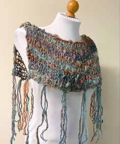 A new twist on an ancient design ~ hand knit in artisan dyed wool. Sky & earth colors. Shoulder Shawl, Earth Colors, Ancient Designs, Wedding Shawl, Wool Vest, Handcrafted Artisan Jewelry, Knit Fashion, Hand Spun Wool, Shawls And Wraps