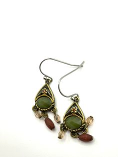 Gorgeous collectible brass and green tone earrings by Lia Sophia Sophia, wood bead, brown, hoop. Sophia Sophia, Green Tone, Lia Sophia, Green Tones, Silver Spring, Pink Earrings, Rhinestone Earrings, White Enamel, Crystal Bracelets