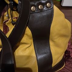 This New Soft Buttery Leather Satchel/Purse Is Absolutely Perfect. This Bag Is Yellow With Dark Brown Trim. Luxury Yellow Crossbody Satchel, Designer Yellow Satchel With Double Handle, Designer Yellow Satchel With Removable Pouch, Designer Yellow Satchel With Detachable Strap, Luxury Yellow Satchel Shoulder Bag, Designer Yellow Leather Bags, Designer Yellow Satchel For Travel, Designer Yellow Bags For Everyday Use, Designer Yellow Leather Satchel