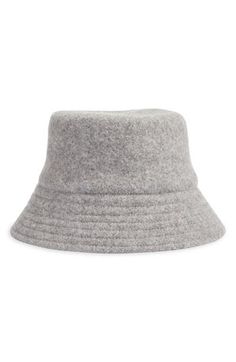 A warm wool blend provide lasting coziness in this classic bucket hat designed to enhance your cold-weather look. 90% wool, 10% nylon Dry clean Imported Gray Winter Cloche Hat With Curved Brim, Wool Winter Bucket Hat, Wool Bucket Hat With Curved Brim For Fall, Casual Adjustable Wool Cloche Hat, Casual Wool Cloche Hat For Winter, Trendy Wool Winter Hat, Trendy Wool Hat For Winter, Classic Winter Bucket Hat, Trendy Winter Cloche Hat With Flat Brim