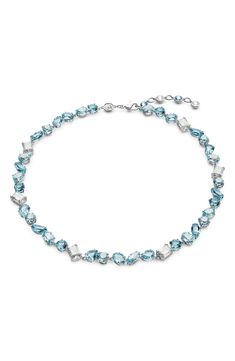 A myriad of crystals in icy blue and clear hues encircles a sparking necklace in signature Swarovski shine. 15" length; 1" extender Swarovski crystal/rhodium plate Imported Swarovski Gemma Necklace, Swarovski Necklace Crystal, Elsa Necklace, Necklace Blue Stone, Resort Casual, Blue Crystal Necklace, Expensive Jewelry Luxury, Jewelry Swarovski, Sparkle Necklace