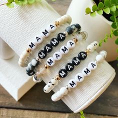 6mm stone bracelets.  Customize with your choice of name, word, initials etc!  Just leave all personalization requests in a note during checkout (note to seller box). Include all information including heart beads and letter bead color. Black or white letter beads available.  Add personalization in notes ex: 1)Mama 🤍Please make note of the letter bead color. White or black!🖤 I am open to other personalization... Added bead color, etc! Just message me! Please review all spelling, sizing and details to order prior to checking out.  Each bracelet is made to order, therefore I am unable to offer returns. Message me if you have questions about length.  If unsure on size measure your wrist and choose a size .5' larger than wrist size. *FREE Shipping on orders over $35 (no coupon needed, USPS Fi Inspirational White Name Bracelet With Round Beads, Mother's Day Personalized Letter Beaded Bracelets, Casual Custom Name Beaded Bracelets With Round Beads, Trendy Beaded Bracelets For Personalized Gifts, Personalized Casual Name Bracelet With Round Beads, Casual Custom Name Beaded Bracelets, Customizable Casual Beaded Bracelets, Custom Name Friendship Bracelets For Mother's Day, Mother's Day 8mm Beaded Bracelets