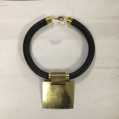 Bold Adjustable Gold Jewelry, Leather Necklace For Gifting, Bold Gold Metal Jewelry, Chic Leather Jewelry For Party, Bold Necklace For Gifts, Bold Necklace For Gift, Chic Gold Jewelry With Large Pendant, Elegant Metal Choker, Handmade Choker Jewelry