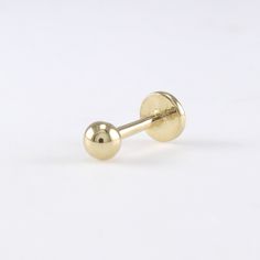 14K Solid Gold 3mm Ball Stud Labret, Cartilage, Tragus, Helix, Conch, Lobe, 14K Solid Gold Piercing Earring, Minimalist Earring, Simple Stud, Geometric Earring Please note that this earring is made to order. S P E C S ♦ All of our jewelry is handmade in our studio in Seoul, Korea. ♦ 14K Gold (available in white, yellow, or rose) ♦ Ball Size 3 mm in diameter ♦ Post Thickness: 1mm / 18 Gauge ♦ Total Length of Post :8mm ♦ Backing Type : Threaded Screw Back, 4 mm in Diameter ♦ Listing is for 1 earri Classic Adjustable Pierced Cartilage Earrings, Classic Adjustable Single Cartilage Earring, Minimalist Internally Threaded Round Piercings, Minimalist 14k Gold Internally Threaded Cartilage Earrings, Minimalist Round Internally Threaded Nose Studs, Adjustable Classic Round Cartilage Earrings, Classic Adjustable Round Cartilage Earrings, Adjustable 14k Gold Cartilage Single Earring, Adjustable 14k Gold Single Cartilage Earring