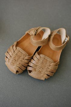 ***Looking for a smaller size? Click HERE to see this same style with smaller sizes in a soft sole.*** Elevate your summer footwear with our Camel Woven Sandals, available in US sizes 5-10. These versatile sandals are the perfect accessory, effortlessly transitioning from casual to dressy occasions. Designed with genuine leather and a sturdy hard sole, they provide the ideal combination of style, comfort, and durability. Key Features: Stylish Design: The intricate woven pattern and camel color m Summer Footwear, Woven Sandals, Statement Shoe, Woven Pattern, Cute Sandals, Mary Jane Flats, Camel Color, Boots And Sneakers, Comfortable Sandals