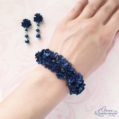 "Navy blue bracelet Dark blue bracelet Navy blue jewelry set Blue flower bracelet Blue bridesmaid bracelet Dark blue jewelry gift Blue wedding Dark blue bracelet with flowers and crystal beads. This bracelet will be a great addition to your look. This bracelet looks great with a bridesmaid dress. It also looks good with a wedding dress if the wedding color is blue. This bracelet will be your favorite. Length of the bracelet approx 18.0см / 7.08\" + extension chain 5см / 1,97\" Please, let me know the scope of your wrist, so I could make the desired bracelet length. A necklace is suitable for these bracelet : https://etsy.me/3nCAimS our https://etsy.me/3fAJMdX A earrings is suitable for these bracelet : https://etsy.me/3rtOiQX A ring is suitable for these bracelet : https://etsy.me/3FzwWHj Blue Flower-shaped Formal Jewelry, Elegant Blue Flower Jewelry, Adjustable Sapphire Bracelets For Wedding, Blue Flower-shaped Wedding Jewelry, Blue Bangle Bracelets For Wedding, Blue Bangle Bracelet For Wedding, Handmade Blue Flower Jewelry For Gifts, Blue Handmade Flower Jewelry For Gifts, Blue Handmade Flower Jewelry As Gift