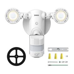 the front view of a white motion activated security camera with two lights on each side