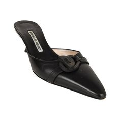 Guaranteed authentic Manolo Blahnik black leather closed toe mule. Small strap with wood buckle on top of shoe.Low heel. Very comfortable. final sale SIZE 36.5USA SIZE 6.5 SHOE MEASURES:HEEL 2.5"UPPER SOLE 9.75" CONDITION: MINT Manolo Blahnik Black, Manolo Blahnik Shoes, Dream Shoes, Mules Shoes, Manolo Blahnik, Mule Shoe, Final Sale, Black Leather, Wedding Ideas