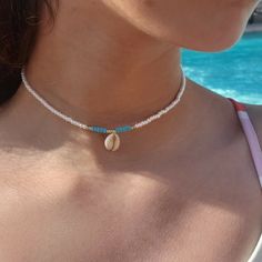 This Shell Choker Is Perfect For A Day At The Beach Or The Pool! Includes The Cutest Pukkajewels Shell To Add Some Beachy Vibes :)) Note!! Please Do Not Wear Or Submerge Necklace In Water!! It Could Potentially Fade/Rust Metals! Measures 13 ½" :)) Made With Stretchy String And Lobster Clasp For Some Extra Strength! Don't Be Shy To Send Me A Message For Any Custom Requests Or Modifications!! <33 Currently Only Shipping In Us Surfer Necklace Aesthetic, Beaded Beach Necklaces, Beachy Chokers, Beachy Necklaces Beads, Blue Beach Jewelry, Beachy Beaded Jewelry, Beachy Beaded Necklace, Obx Necklaces, Surf Fits