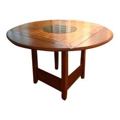 a wooden table with a hole in the center