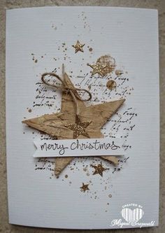 a christmas card with an origami bird on it