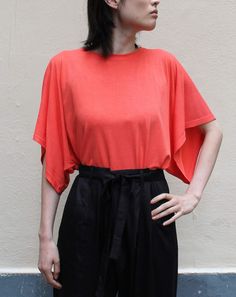 Take flight with this butterfly top with kimono sleeves! In fine viscose jersey, to stay fresh even in the heart of summer. Easy to match with a haori jacket or a long kimono in warm tones... Available in 2 colors: ivory or mandarin. Exists in long and mid-length dresses. 100% Viscose Obi belt are here ! https://www.etsy.com/your/shops/Trazita/tools/listings/page:3/1010349293 Length/Width/Total sleeve S≃70cm49cm82cm M≃70cm53cm84cm L≃70cm57cm86cm XL≃70cm61cm88cm Summer Viscose T-shirt With Short Sleeves, Summer Tops With Relaxed Fit And Kimono Sleeves, Spring Tops With Kimono Sleeves And Relaxed Fit, Spring Tops With Relaxed Fit And Kimono Sleeves, Relaxed Fit Tops With Kimono Sleeves For Spring, Relaxed Fit Top With Kimono Sleeves For Summer, Summer Short Sleeve Viscose T-shirt, Summer Tops With Butterfly Sleeves And Stretch, Stretch Summer Tops With Butterfly Sleeves