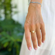 A dreamy and romantic opal ring featuring a round cut in a bezel setting and an elegant polished band in 14K gold plating over sterling silver.
A delicate vintage design and a glowing opal stone make this a truly unique piece. Healing Jewelry, Opal Stone, Opal Ring, Crystal Shop, Opal Crystal, Crystal Rings, Opal Rings, Bezel Setting, Crystals And Gemstones