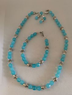 Beautiful Ocean blue colored Czech glass beads with Silver Pewter spacers. Necklace is 18 inches long. Bracelet is 8 inches. Earrings are in French lever-backs that are played surgical steel. Long Bracelet, Bracelet And Earring Set, Caribbean Blue, Beautiful Ocean, Blue Necklace, Ocean Blue, Czech Glass Beads, Necklace Bracelet, Blue Ocean