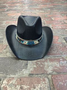 This Shapeable 100% straw cowboy hat is perfect for the rodeo, floating the river, or just adding to your western outfit. The metal plated turquoise hatband adds unique western flair that is sure to make you stick out from the crowd! This unisex hat is great for him or her! The one size elastic hat band on the inside of the hat makes this hat fit most everyone. one size fits most. The wire brim allows the owner to style and shape the hat to his or her liking. Material: Straw Sizing: one size fit Straw Hat Bands With Short Brim For Rodeo, Southwestern Style Adjustable Fedora For Kentucky Derby, Adjustable Southern Style Hat Bands For Country Events, Southwestern Hats For Kentucky Derby And Country Events, Straw Fedora Hat For Rodeo, Southwestern Style Hats For Kentucky Derby, Western Style Sun Hat With Curved Brim, One Size Sun Hat For Kentucky Derby And Rodeo, Southern Style Flat Brim Hat Band For Rodeo