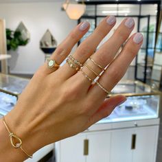 The perfect pairing with our favorite gold disc huggies! Everyday Yellow Gold Jewelry With Single Cut Diamonds, Classic Huggie 14k Gold Rings, Classic 14k Gold Huggie Rings, Everyday Gold Huggie Rings, Everyday Gold Round Diamond Ring, Elegant Adjustable Huggie Rings, Elegant Stackable 14k Gold Filled Rings, 14k Gold Huggie Rings For Everyday, Minimalist 14k Gold Huggie Rings