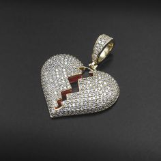 Description: Introducing our stunning Broken Heart Pendant, a symbol of love and passion. This exquisite pendant is fully encrusted with small pave white cubic zirconia stones, while the broken heart is split down the middle to reveal a beautiful red painted enamel. Available in solid sterling silver or 14k gold-plated sterling silver, and adorned with high-quality cubic zirconia stones, this pendant is a true expression of love and commitment that is sure to dazzle and enchant all who see it. S Valentine's Day Double Heart Jewelry In Pave Setting, Red Diamond Heart Pendant Jewelry, Red Cubic Zirconia Heart Pendant Jewelry, White Double Heart Jewelry With Vvs Clarity, Double Heart Pave Setting Jewelry For Gifts, Valentine's Day Pendant Jewelry With Pave Setting, Valentine's Day Jewelry Pendant With Pave Setting, Double Heart Rhinestone Jewelry For Anniversary, Valentine's Day Jewelry Gift With Pave Setting