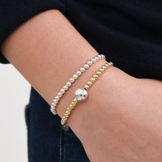 One of our classics from the beaded lux collection. Stack this dainty stretch bracelet with other metals to mix it up or keep it all silver! This style is created with one of our "stretchy" cords for easy wear and effortless bracelet stacking. Sterling Silver beads are approximately 4mm in size. We want to make sure your stretch bracelet has the perfect fit, so we have created sizing options to select above. Please contact us if you have any sizing questions or would like a custom size. Watch Bracelet Stack, Bracelet Stacking, Stacking Bracelets, Watch Bracelet, Linen Bag, Lariat Necklace, Sterling Silver Bracelet, Silver Accents, Bracelet Stack