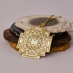 14K Gold Handmade Sri Yantra Necklace - Spiritual Gold Necklace, It can be considered a spiritual gift. Pendant Details 💎 Gold KT: 14K Solid Gold or 8K Solid Gold 💎Gold Color Options: Yellow Gold, White Gold, Rose Gold 💎Thickness: 0.80 mm ✈️ Ready to Ship in 4-7 Business Days ✈️ Transportation is provided by express cargo MORE OF US Pendants and Necklaces: https://goldencastlejewelry.etsy.com NECESSARY INFORMATION 🧡 We provide workshop service in Ankara, we are happy to share our knowledge a Luxury Ceremonial Temple Necklace Pendant, Spiritual Gold Jewelry For Diwali, Spiritual Medallion Jewelry, Temple Jewelry Pendant Necklace As Gift, Spiritual Jewelry With Intricate Design, Spiritual Necklace With Intricate Design For Diwali, Spiritual Necklaces With Intricate Design For Diwali, Symbolic Jewelry For Puja And Festivals, Engraved Temple Jewelry As A Gift