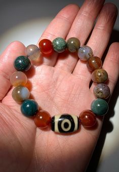 "Tibetan Agate Dzi Beads \" 2 Eyes \" Amulet Bracelet # T612766 DZI Size About : 19mm x12.9mmx10.5mm(Oblate bead) Agate Size About : 11.8mmEach Bead(Total 15 Beads) The buyers are responsible for the customs & duties if it may apply." Spiritual Bracelets With Large Round Beads, Healing Bracelets With Large Beads, Spiritual Agate Beaded Bracelets With Large Beads, Agate Beaded Bracelet With Large Beads, Agate Gemstone Beaded Bracelets, Unique Round Agate Beaded Bracelets, Traditional Agate Round Bead Bracelets, Multicolor Agate Round Beaded Bracelets, Multicolor Agate Bracelets With 8mm Beads