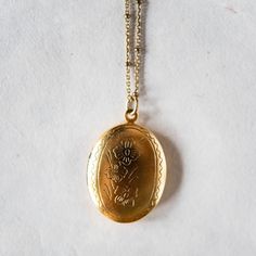 Personalize our popular Locket Necklaces with hand stamping on the inside! Lockets on 18" gold or silver plated satellite chain. Add on a small accent/birthstone for an additional $5 here: https://bit.ly/BVJBirthstoneAddOn Please tell us what you would like stamped on the charms in the "Notes" section at check out. Handcrafted in Little Rock, Arkansas Our images are the best representation of our designs and there may be some variation in your shipment due to the handmade nature of our products. Gold Round Locket Necklace Stamped 14k, Antique 14k Stamped Medallion Locket Necklace, Victorian 14k Gold Stamped Locket Necklace, Engraved Silver Brass Locket Necklace, Engraved Silver-colored Brass Locket Necklace, Round Necklace, Hand Stamped Jewelry, Stamped Jewelry, Brass Jewelry