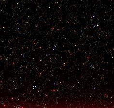 the night sky is filled with stars and bright red light in the foreground, as well as black background